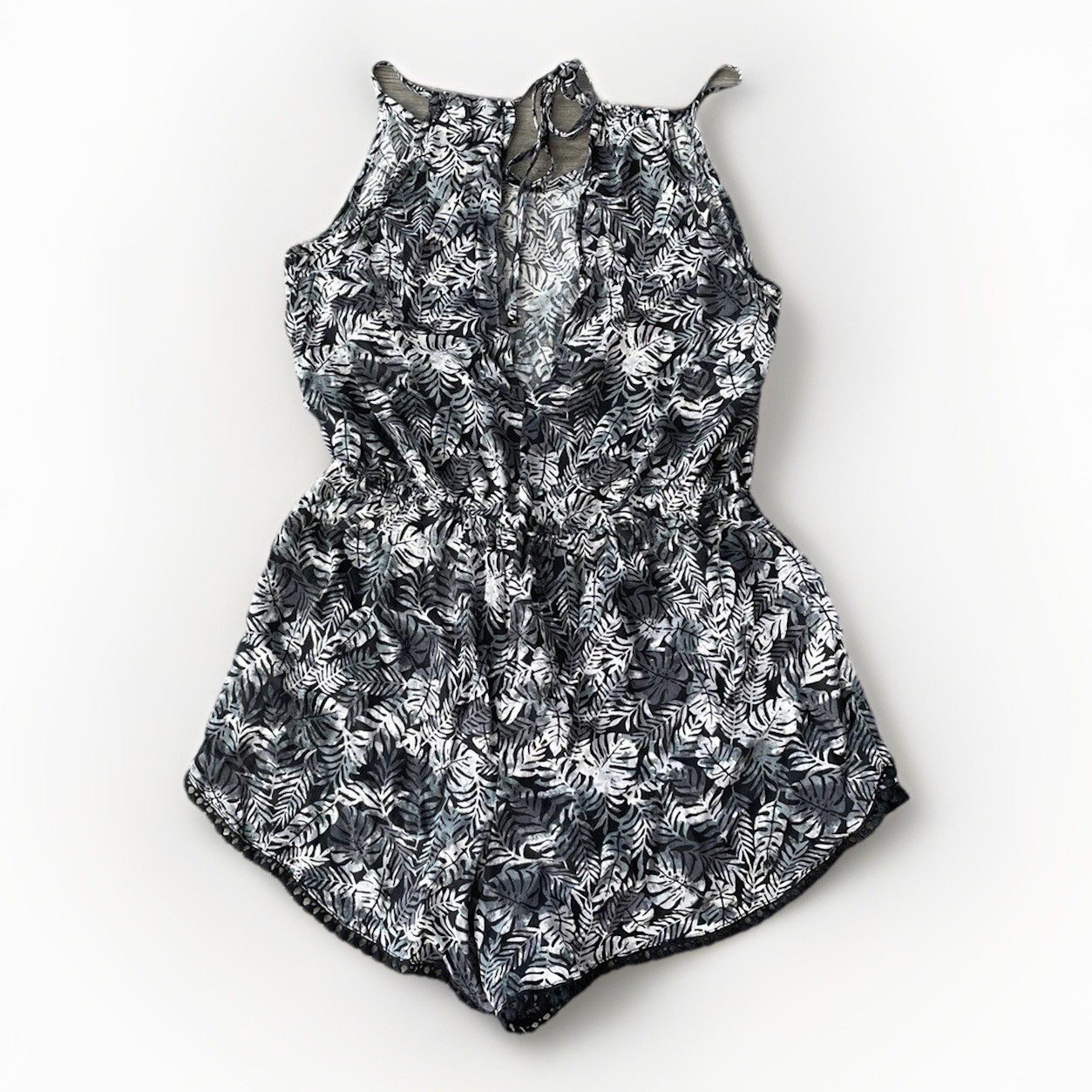 BP Black Floral Romper Size XS Pom Hem Sleeveless Tie
