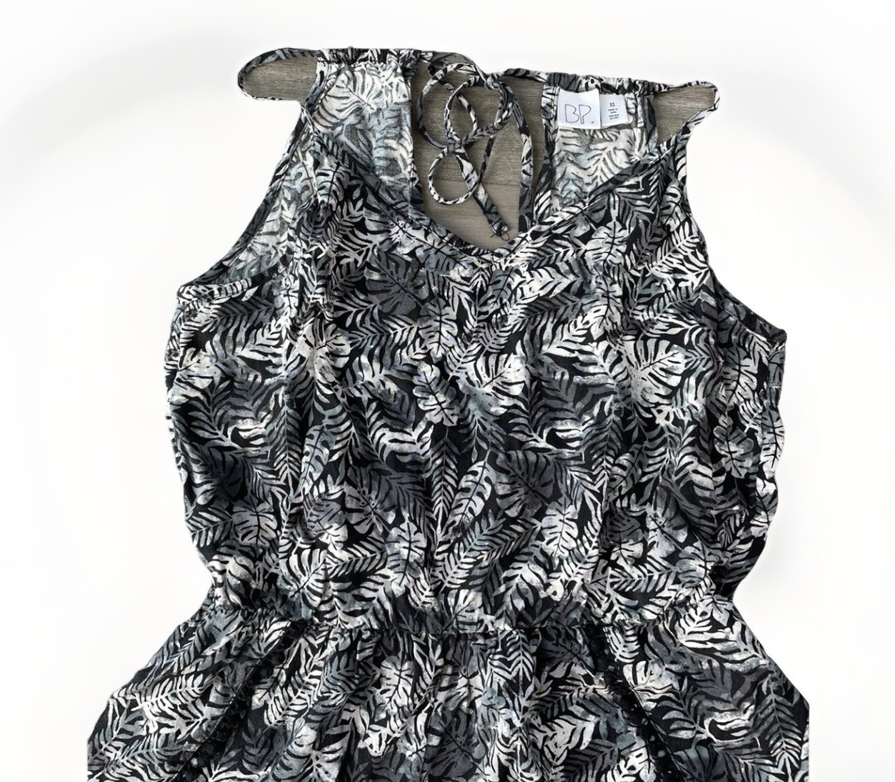 BP Black Floral Romper Size XS Pom Hem Sleeveless Tie