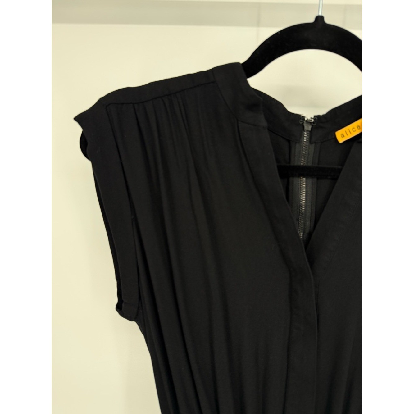 Alice Olivia Utility Jumpsuit Black Sleeveless Cargo Pockets Tapered Leg Chic