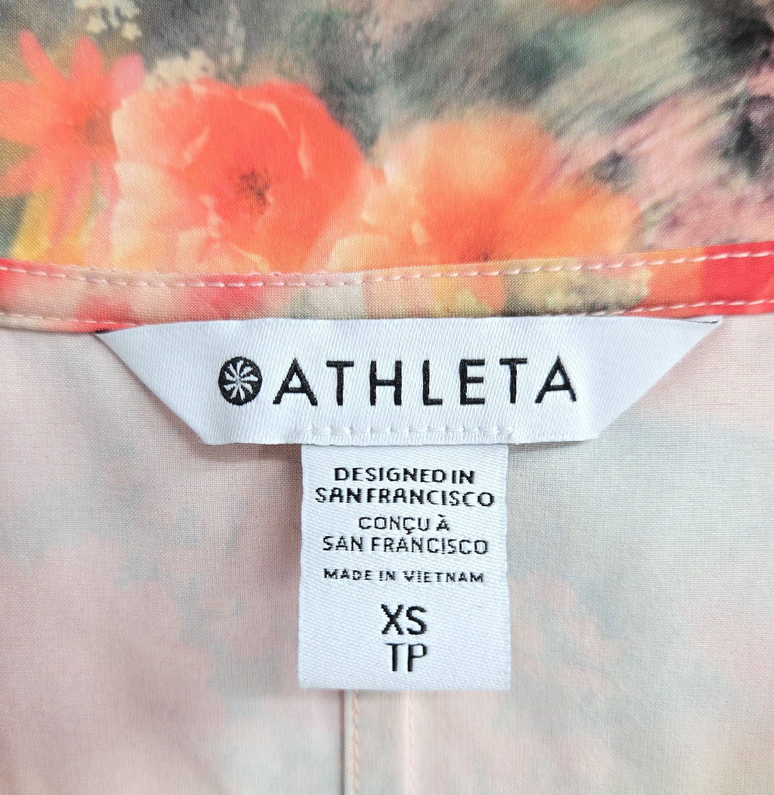Athleta Marlow Romper Size XS Tall Peach Floral Pockets Activewear Athlesure