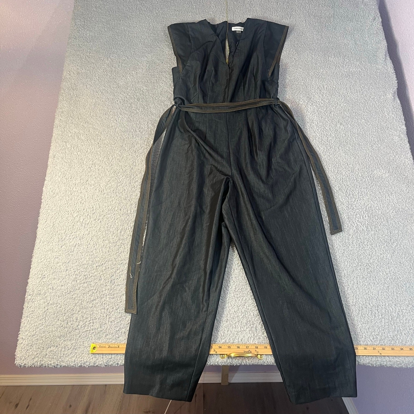 Calvin Klein dark wash denim jumpsuit with tie belt size 10 sleeveless rear zip