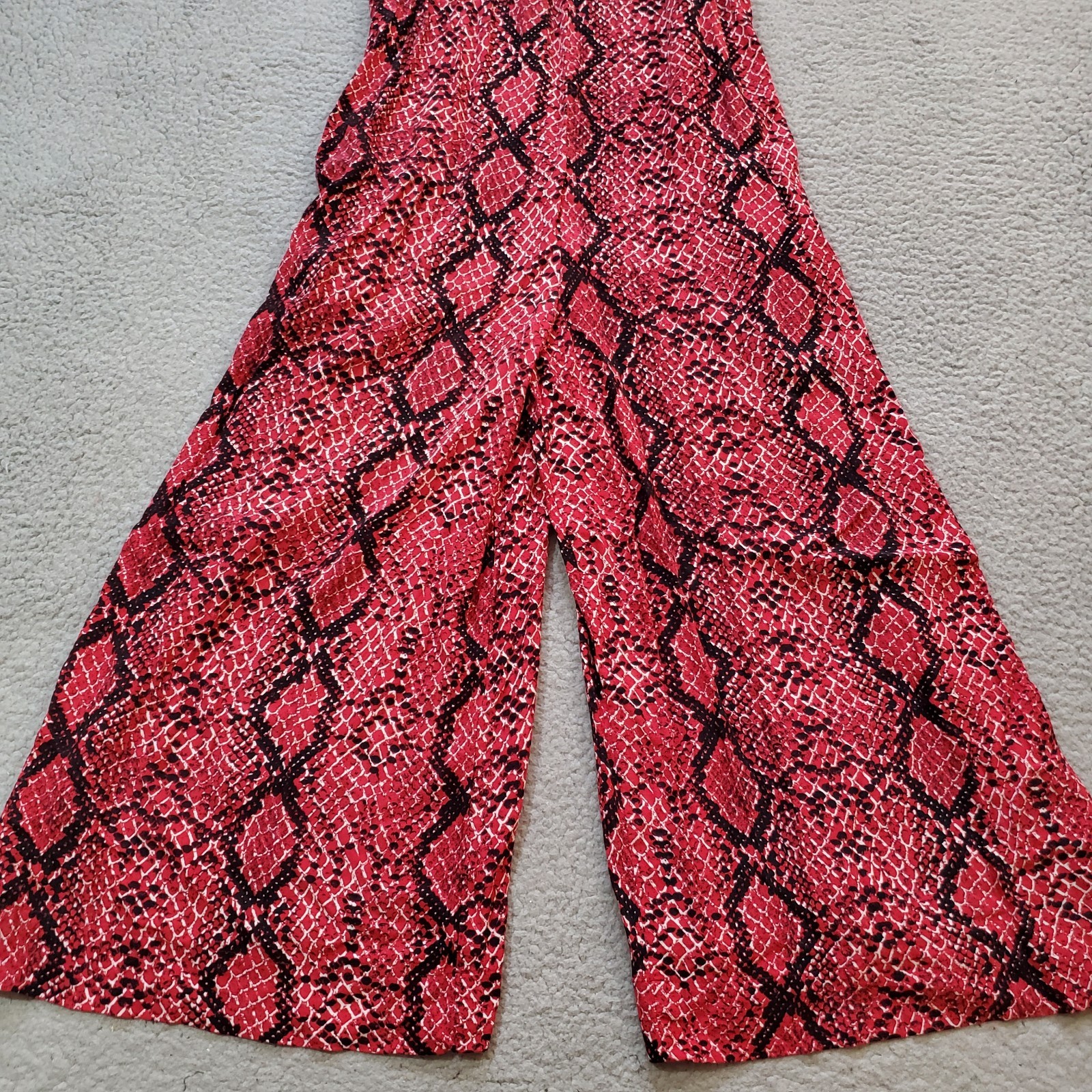 Free People Jumpsuit Womens Mediujm Red Black Snakeskin Pockets Wide Leg Baggy