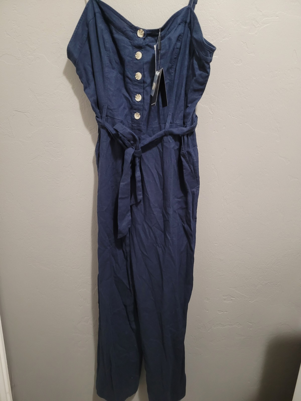 Navy Rails Harper linen-blend jumpsuit with a tie waist and cropped wide-leg…