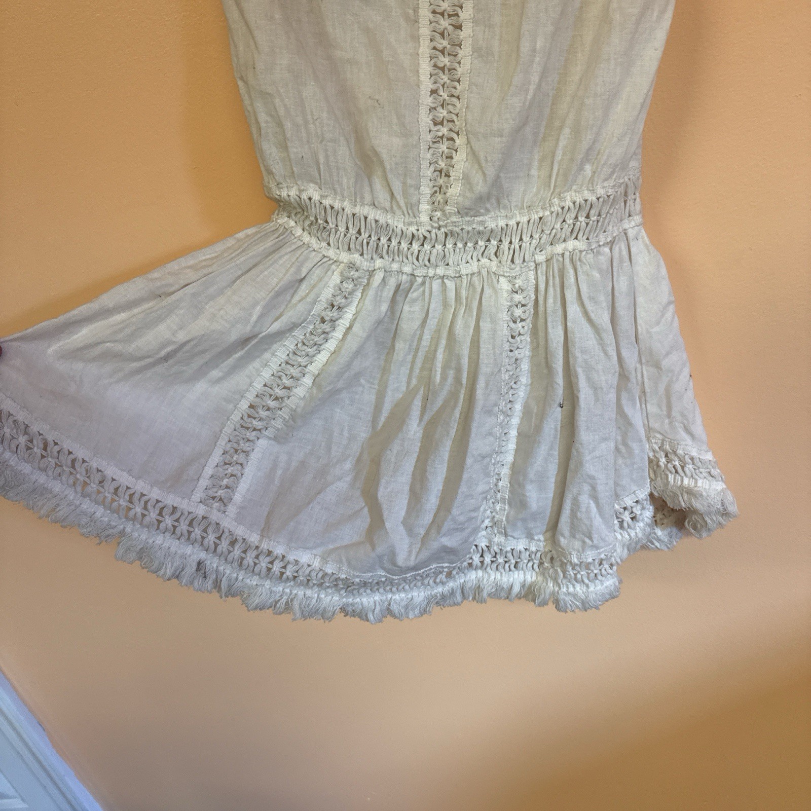 Cream and white romper with lace and tie back detail