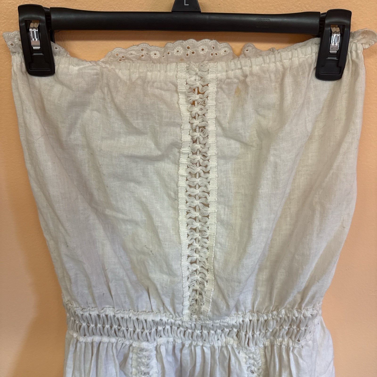 Cream and white romper with lace and tie back detail
