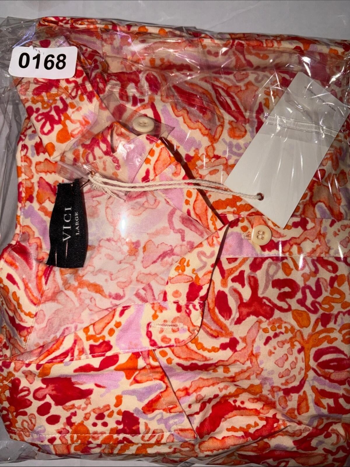 NWT VICI Orange and Pink Belted Romper with Long Bell Flare Sleeve Size Large