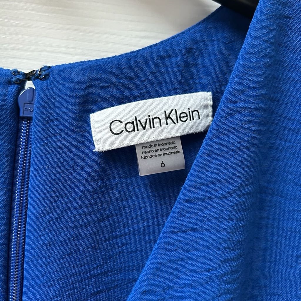 Calvin Klein Sleeveless V-Neck Belted Wide-Leg Jumpsuit in Royal Blue