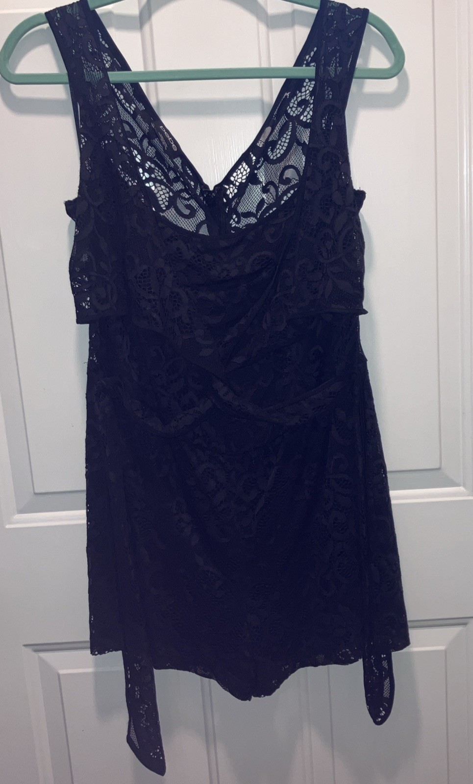 BEBE vintage womens lace romper. XL. lined inside. side ties &zipper on back.
