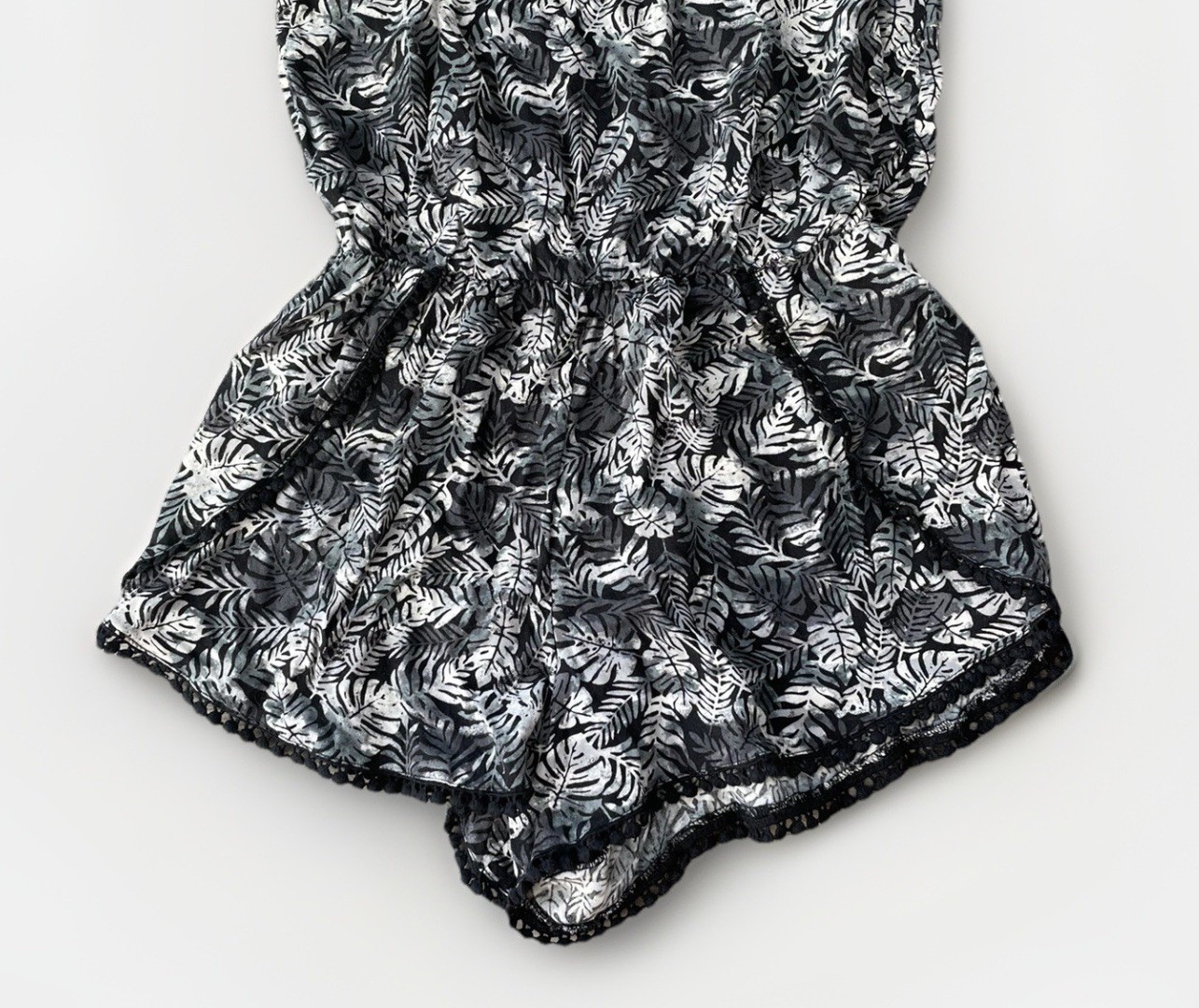 BP Black Floral Romper Size XS Pom Hem Sleeveless Tie