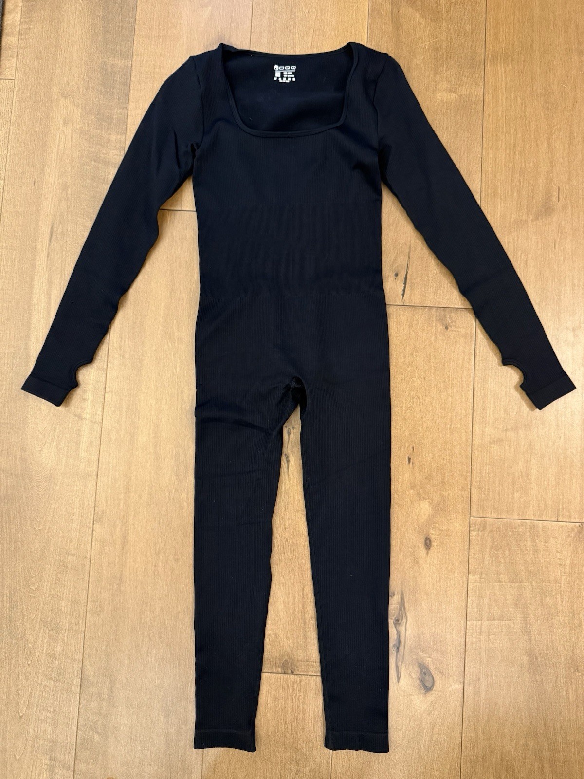 Amazon’s 0QQ Women’s Black Ribbed Long Sleeve/ Pants Workout Bodysuit-Size Small