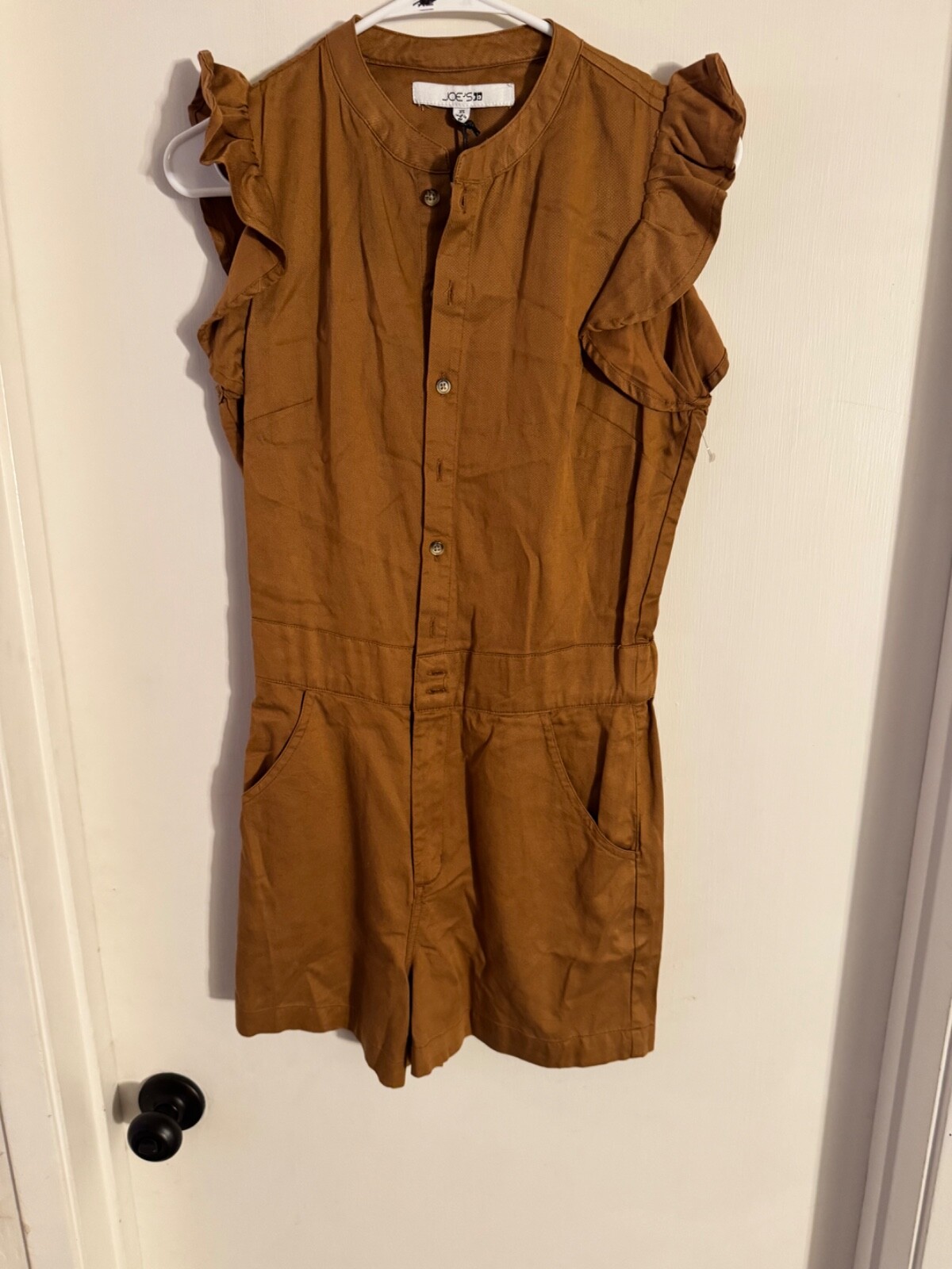 Women NWOT “Joe’s” caramel color short sleeve,button up romper. Size S