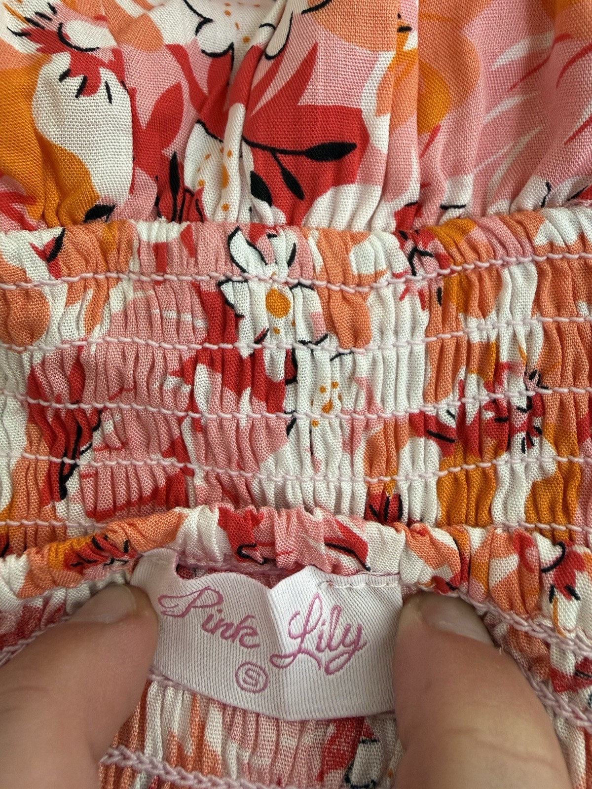 Pink Lily Romper Womens Small Floral Smocked Summer Vacation Outfit