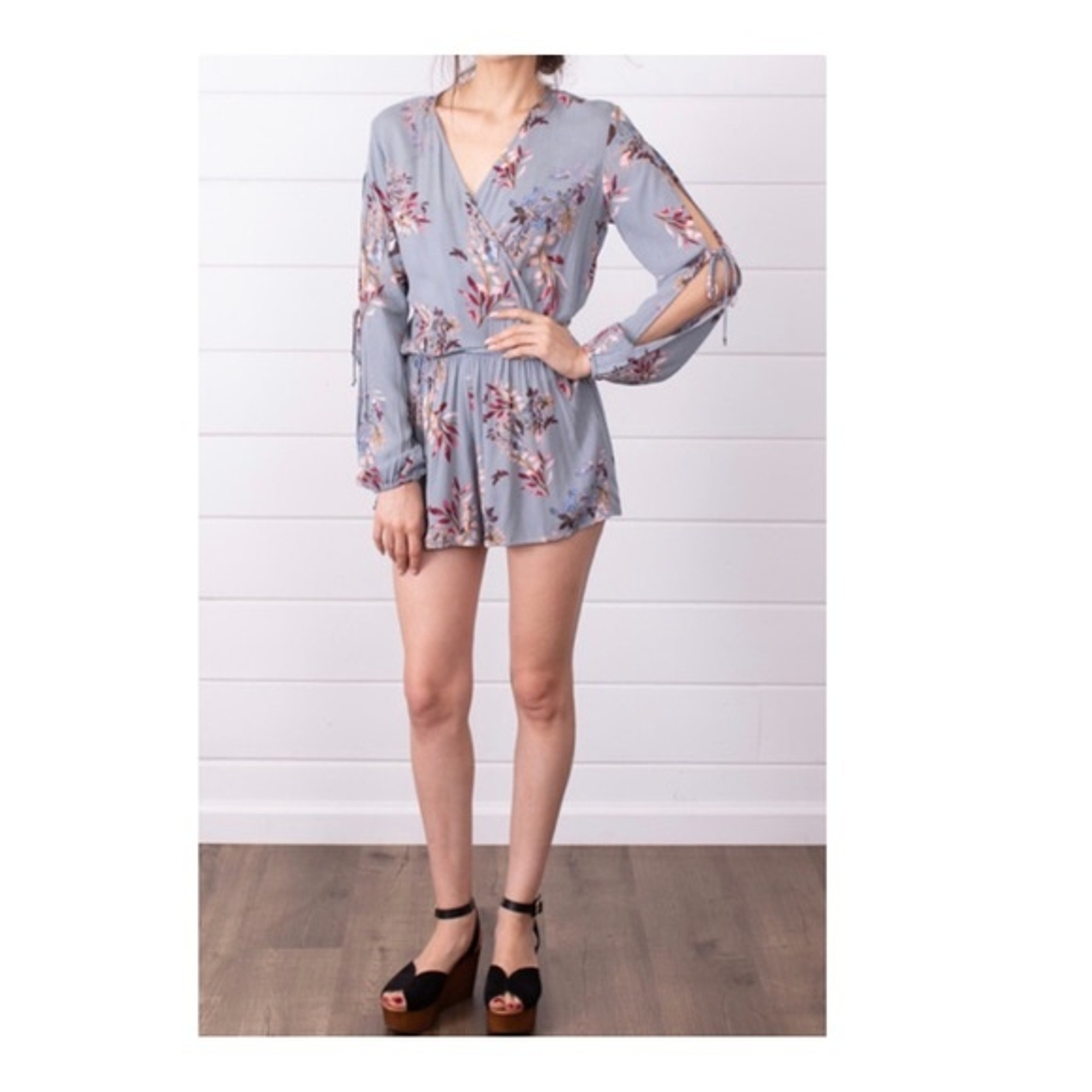 . Lovestitch Long Sleeve Blue Romper Women’s size M.