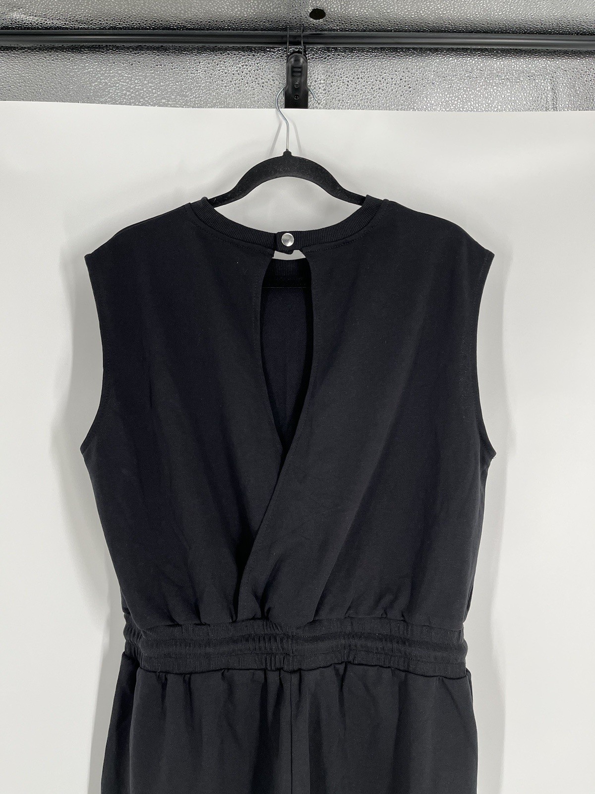 NWT Flygo jumpsuit size L black sleeveless tapered leg waist drawstring stretch