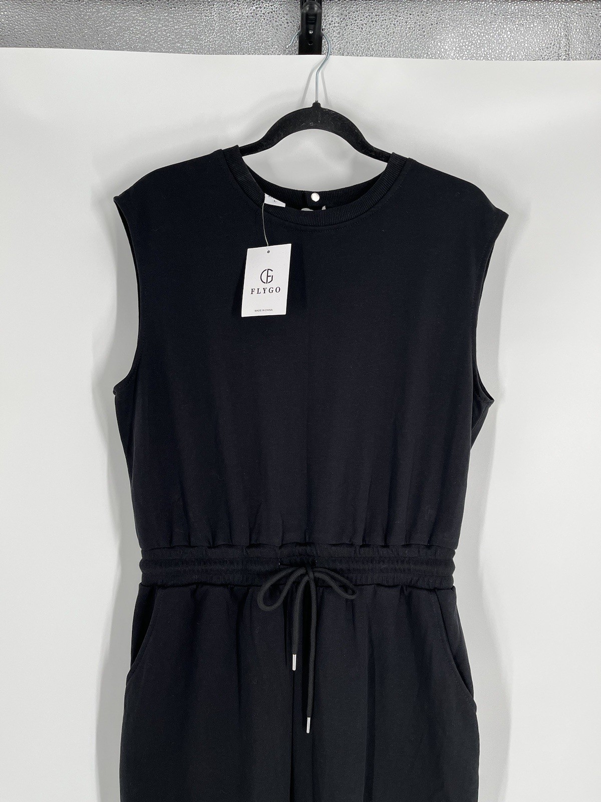 NWT Flygo jumpsuit size L black sleeveless tapered leg waist drawstring stretch