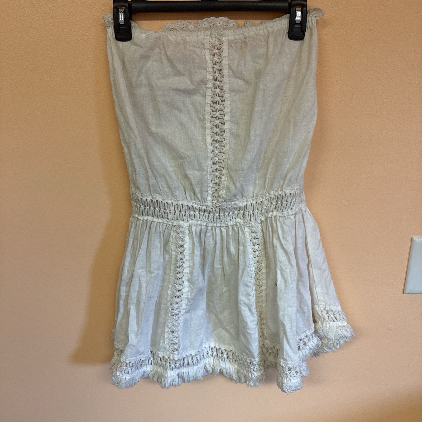 Cream and white romper with lace and tie back detail